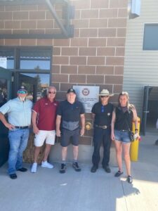 Group photo in front for Fire Training building