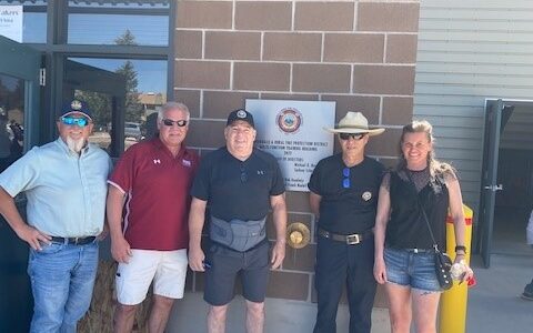 Group photo in front for Fire Training building