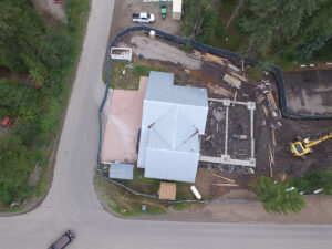 Aerial view of Marble Fire Station during construction showing footprint of new addition.