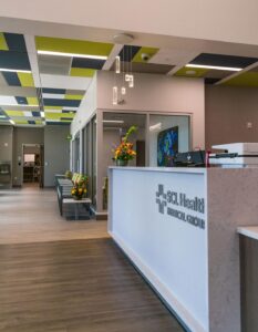 Photos of SCL Health Primary Care Center Welcome Desk Area