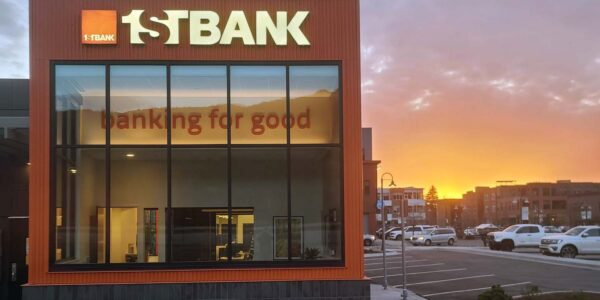 Photo of newly constructed 1st Bank building in Basalt, CO at sunset highlighting custom brick veneer and distinctive orange siding